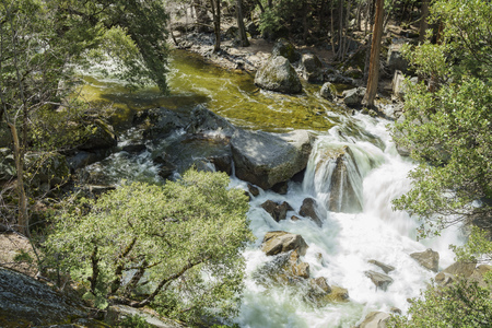 Merced river with snow and mountains at Yosemite National Park, California, USAの写真素材
