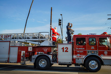 Los Angeles, DEC 3: Decorated fire fighter in Highland Park christmas parade on DEC 3, 2017 at Los...