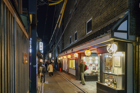 Kyoto, NOV 25: Night view of a small street with restaurant that local people love to go on NOV 25, 2017 at Kyoto, Japanのeditorial素材