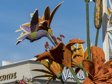 Pasadena,  JAN 1: Hummingbird and flower style float in the famous Rose Parade - America's New Year Celebration on JAN 1, 2017 at Pasadena, California, United Statesのeditorial素材