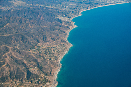 Aerial view of Malibu area with ocean and mountains, Los Angeles County, Californiaの写真素材