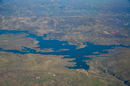 Aerial view of Don Pedro Reservoir from an airplane, Californiaの写真素材