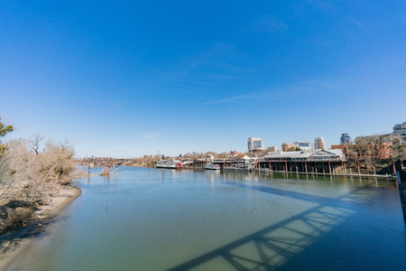 Sacramento, FEB 21: Sunset view of Sacramento skyline with Sacramento River on FEB 21, 2018 at Sacramento, Californiaのeditorial素材
