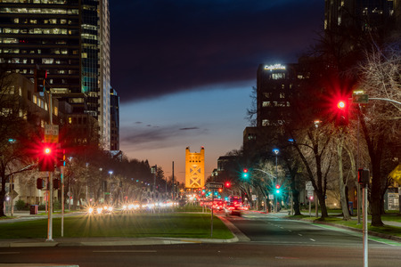 Sacramento, FEB 21: Night view of the historical downtown Sacramento with tower bridge on FEB 21, 2018 at Sacramento, Californiaのeditorial素材