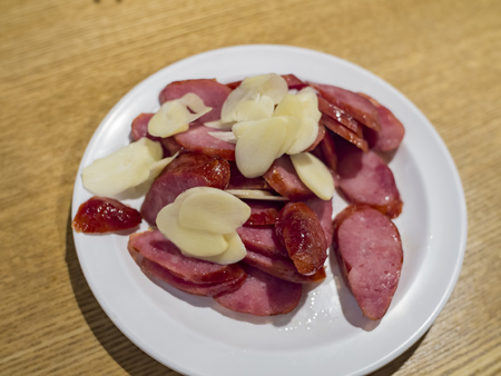 Taiwanese style grill sausage with garlic slice, ate at Los Angelesの写真素材