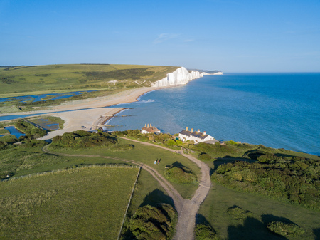 Aerial view of the famous landscape, Seven Sisters Cliffs with Coastguard Cottages at West Sussex, United Kingdomの写真素材