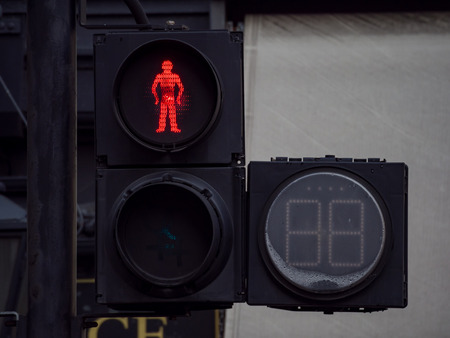 Red traffic light at London, United Kingdomの写真素材