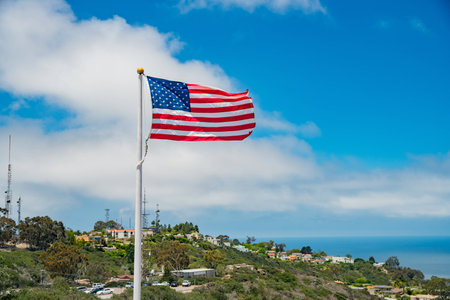 American flag swinging with  ocean view around La Jolla aera, San Diego, Californiaの写真素材