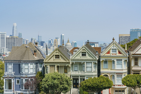 San Francisco, AUG 18: Afternoon view of the famous Painted Ladies with downtown building on AUG 18, 2018 at San Francisco, Californiaのeditorial素材