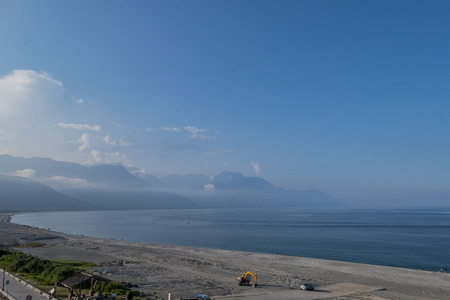 Beautiful beach, shore, moutain landscape of east coast Taiwan at Hualienの写真素材