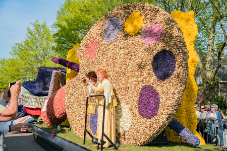 Netherlands, APR 21: Artist, painter shape float in the beautiful and colorful flower parade on APR 21, 2018 at Netherlandsのeditorial素材