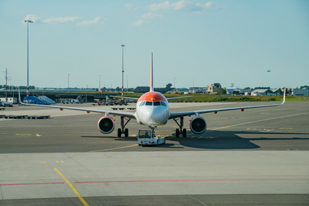 Schiphol, JUL 21: Airplane parked in the Schiphol international airport on JUL 21, 2017 at Schiphol, Netherlandsのeditorial素材