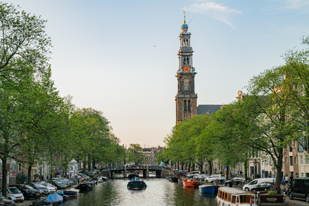 Amsterdam, JUL 21: The historical Westertoren church with canal view on JUL 21, 2017 at Amsterdam, Netherlandsのeditorial素材