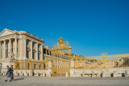 Versailles, MAY 4: The golden entrance gate of the famous Palace of Versailles on MAY 4 at Versailles, Franceのeditorial素材