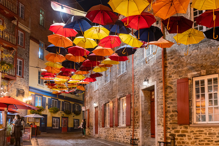 Quebec, OCT 3: Night view of the Breakneck Steps area with colorful umbrella hanging on OCT 3, 2018 at Quebec, Canadaのeditorial素材