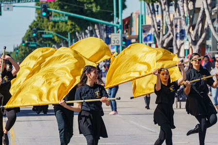 Los Angeles, FEB 23: Tomas Rivera Middle School Marching band parade in the Camellia Festival on FEB 23, 2019 at Los Angeles, Californiaのeditorial素材