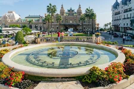 Monaco, OCT 21: Fountain and the famous Casino Monte-Carlo on OCT 21, 2018 at Moncoのeditorial素材