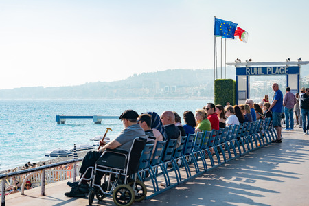 Nice, OCT 20: The beautiful Nice beach with many visitor enjoying sunbath on OCT 20, 2018 at Nice, Franceのeditorial素材