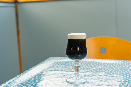 Close up shot of a glass of dark beer at Galway, Irelandの写真素材