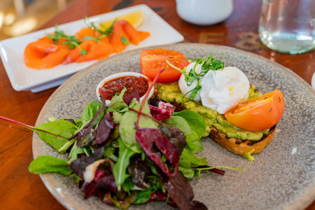 Close up shot of a plate of vegetable salad and smoke salmon slice at Dublin, Ireland