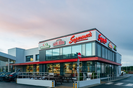 Dublin, OCT 27: Exterior view of a building of three fast food restaurant - Supermac, Supersub & Papa John on OCT 27, 2018 at Dublin, Irelandのeditorial素材