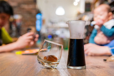 Close up shot of a glass of cold black coffee