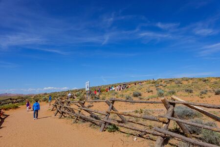 Page, MAY 14: People walking around the trail of the beautiful Horseshoe Bend on MAY 14, 2019 at Page, Arizonaのeditorial素材