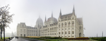 Foggy view of the Hungarian Parliament Building in a haze morning at Budapest, Hungaryのeditorial素材
