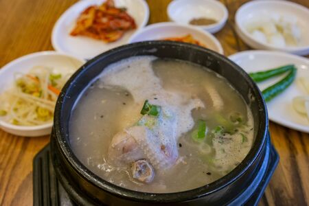 Close up shot of boiled Ginseng chicken soup, ate at Busanの写真素材