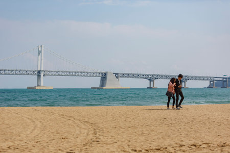 Busan, APR 4: Morning view of the Guangan Bridge and the Gwangalli Beach on APR 4, 2014 at Busan, South Koreaのeditorial素材