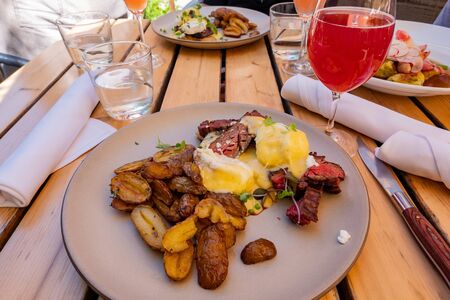 Close up shot of bake potato with egg benedict and steak, ate at Calgary, Canadaの写真素材