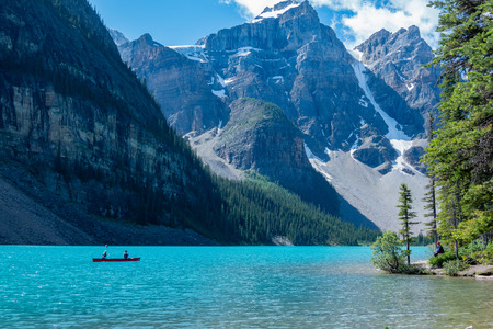 People kayaking in Moraine Lake at Banff National Park, Canadaのeditorial素材