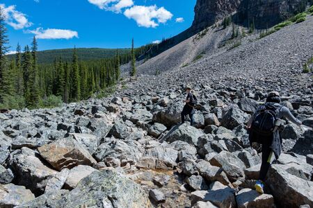 Banff, JUL 25: People hiking in the beautiful of Moraine Lake on JUL 25, 2019 at Banff, Canadaのeditorial素材
