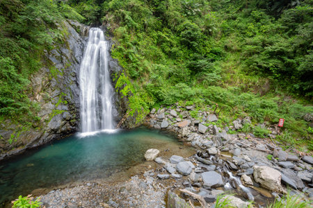 Morning view of the Xinliao Waterfall at Yilan, Taiwanの写真素材
