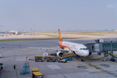 Hong Kong, OCT 20: Airplane parked in the famous Hong Kong International Airport on OCT 20, 2019 at Hong Kong, Chinaのeditorial素材