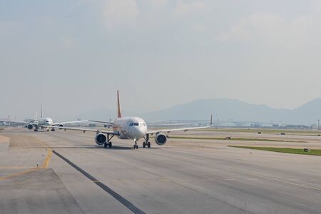 Hong Kong, OCT 20: Airplane ready to take off from the famous Hong Kong International Airport on OCT 20, 2019 at Hong Kong, Chinaのeditorial素材
