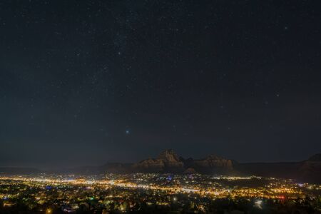 Night starry sky with the beautiful Capitol Butte landscape of Sednoa at Arizonaの写真素材