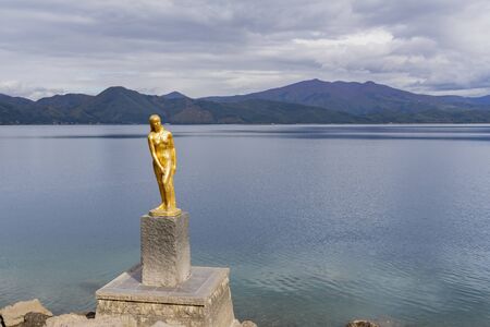 Statue of Tatsuko in Lake Tazawako at Akita, Japanの写真素材