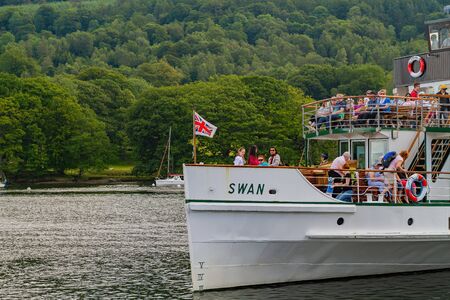 Ambelside, JUL 13: Peope enjoying the beautiful landscape  of Lake Windermere on JUL 13, 2011 at Ambelside, United Kingdomのeditorial素材