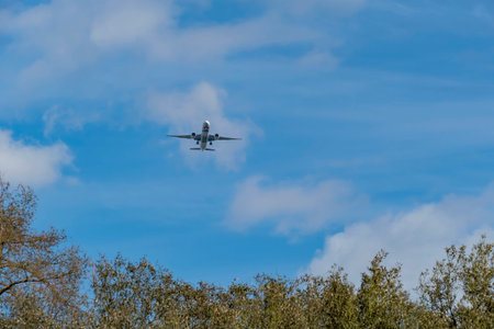 Airplane flying with a beautiful background at Richmond, United Kingdom