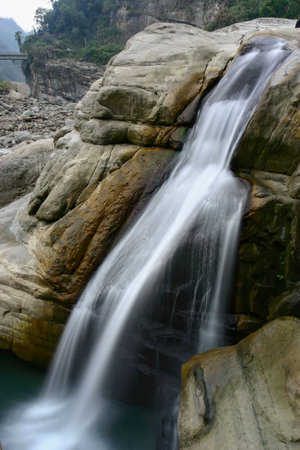 Long time exposure shot of a creek and rocks at Gukeng, Taiwan