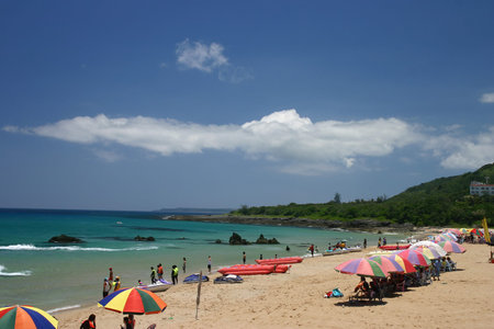Pingtung, JUN 12: People playing on the Kenting beach on JUN 12, 2004 at Pingtung, Taiwan