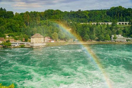The biggest waterfall - Rhine Falls with rainbow at Europe, Zurich, Switzerlandのeditorial素材