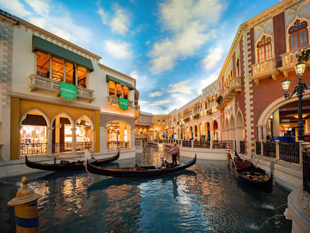 Las Vegas, JUN 8, 2020 - Tourist wearing mask in the Gondola while enjoying the Grand Canal Shoppesのeditorial素材