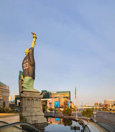 Las Vegas, SEP 15, 2020 - Afternoon sunny view of the Statue of Liberty wear Raiders football shirt and face maskのeditorial素材