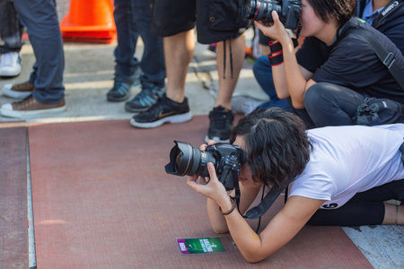 Taipei, APR 29, 2012 - Pohotgrapher taking picture in the Nike's Be Amazing 5K race event