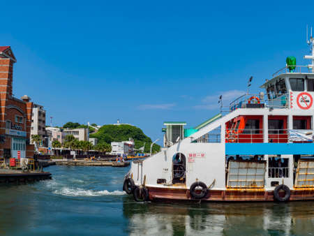 Kaosiung, SEP 9, 2012 - Sunny view of the ferry traveling around the Gushan District and Cijin Districtのeditorial素材