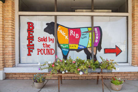 Utah, OCT 6, 2020 - Cow anatomy art drawing in front of a butcher shopのeditorial素材