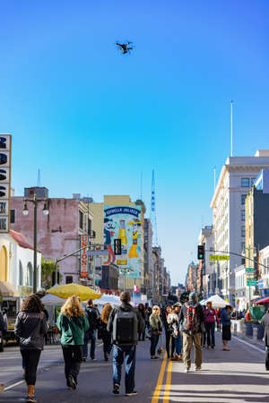 Los Angeles, JAN 21, 2017 -Man using a drone to record the Women March eventのeditorial素材