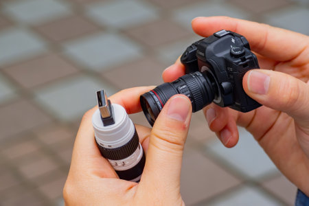 Taipei, MAR 10, 2012 - Close up shot of a lens and camera shape USB Thumb driveのeditorial素材